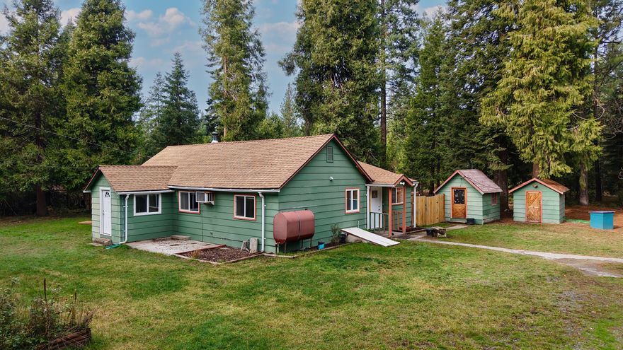 Possible low-rate VA Assumable loan. Wonderful opportunity to live in one of the most beautiful mountain communities at the Gateway to all year around outdoor activities. This delightful 4-bedroom home, 1-bath of 1,440-sq. ft. on 2.64-acres with a tall 40x40-metal shop on concrete floor, room for animals should you desire. This gives you all you'll need to enjoy your life here! Summertime you are at the head waters of the Rogue River for fishing and rafting, tons of hiking trails and lakes galore. Wintertime you are near Diamond Lake for ice fishing, snowmobiling and so much more. Just a few miles to Crater Lake National Park. This darling property has Barr Creek running through for your private picnic area.