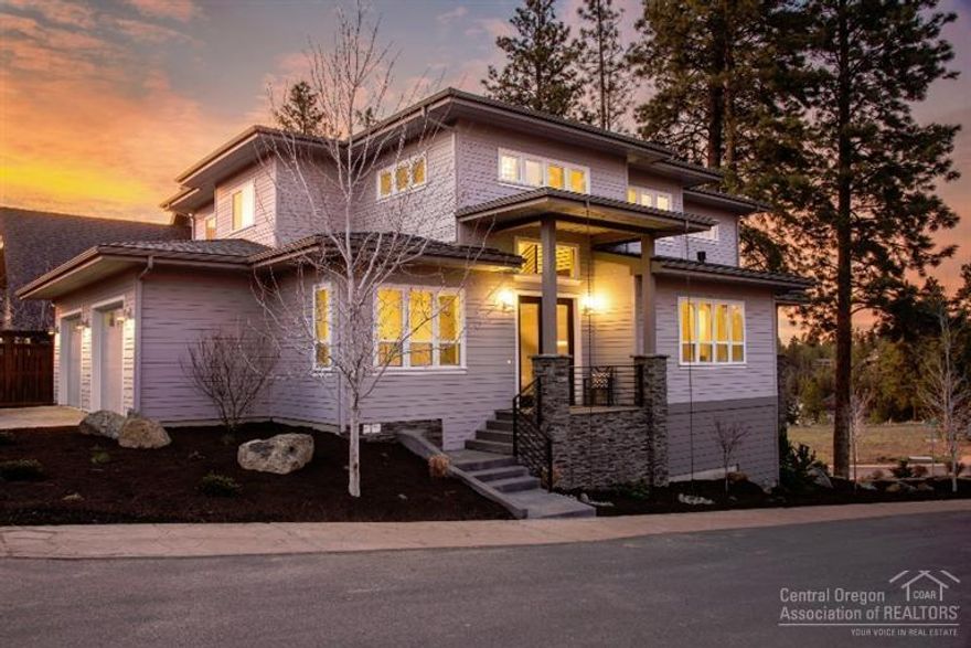 Deschutes River View Property from this brand new Sienna Building & Design built home. Custom Contemporary Craftsman on a 1/4 acre corner lot. Main level interior is organized around a central living core connecting the large island gourmet kitchen, dining and greatroom areas. The greatroom features an 8x12 bi-parting window wall that opens up to a large covered heated outdoor living area looking out to the Deschutes River! 4 full bedrooms plus a Den, Loft and a lower level Family Room!