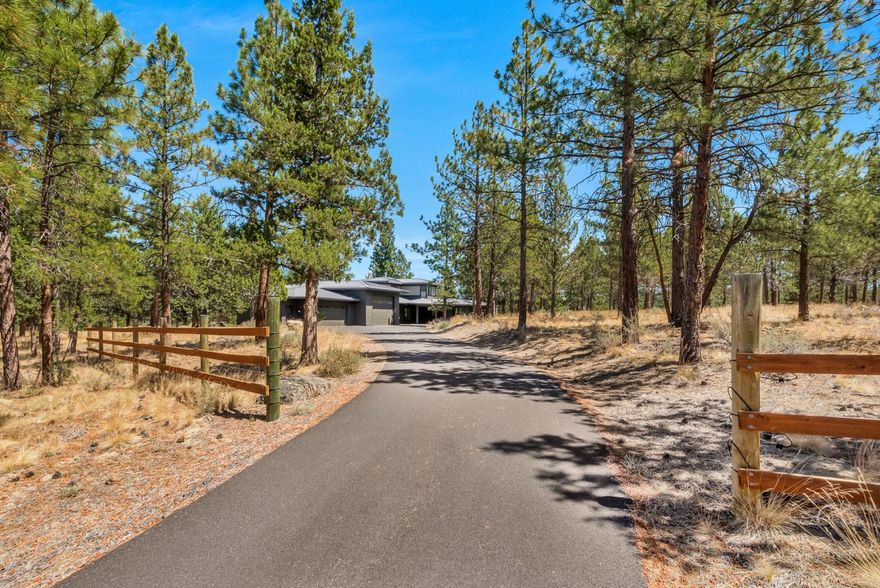 Custom home on an extremely private 8.08 acres just past Aspen Hall on Bends coveted West Side. That's right over 8 acres of pine tree covered property bordering Tumalo creek and Shevlin park with direct access to the trails in Shelvin Park. There is nothing else like it available this close in. It gets better, newer custom built contemporary prairie style home with 3826 sqft and 2000 sqft of heated attached garage space. Listen to the sounds of Tumalo creek from your private covered porch.