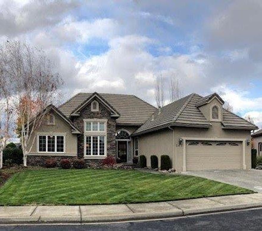 Located in one of the most desirable cul-de-sacs on Robert Trent Jones Golf Course you will find this immaculate and well-appointed home that sits on the 5th hole of the golf course. Three bedrooms, two full bathrooms, formal and informal dining, office and an open kitchen that looks over the living room and breakfast nook! Master bathroom has been remodeled and has jetted tub, walk-in closet and beautiful tile flooring. The open floor plan allows for views of the gold course. Living area has vaulted ceilings and a corner gas fireplace. Kitchen is large with white cabinets, stainless appliances, gas top and a ton of storage. Garage is extra-large to fit 2 cars and a golf cart! Extra storage above the garage with pull-down stairs for easy access. Outside patio to enjoy the views and relax. Backyard is fenced and semi-private on both sides with mature landscaping!