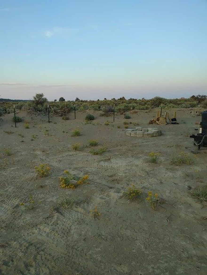 This property is 5-acre corner lot on a gravel road. Close to town. Corner of Rainbow & Honeydew.  Property has been surveyed and has pins from previous owners.  Part of the property has been cleared for camping spot with Fire pit in place for the chilly evening. The rest of the property has been left natural, driveway entrance is located on Rainbow Rd,
Property is a great get away camping spot.
One of the listing agents is a licensed realtor in the state of Oregon.