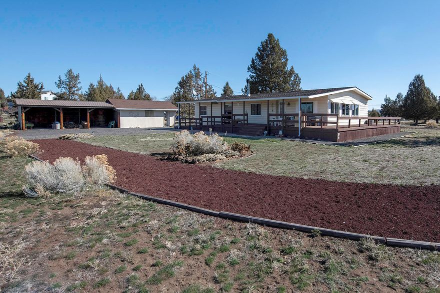 Set back off of a paved road, in the middle of the relaxing and picturesque Crooked River Ranch, you will find this move-in ready home waiting for you!  On cooler nights, cozy up in the warm living room, next to the wood stove.  In the summertime, find comfort knowing the heat pump will keep you cool.  A wrap-around deck offers morning sunshine and afternoon/evening shade.  The open backyard makes this home the perfect place to host a get-together.  Minimally landscaped means less upkeep, or for those with a green thumb, an open canvas to design the oasis you need.  With loads of amenities readily available; whether on the ranch or the immediate vicinity, you will have your hands full enjoying the sights, sounds and fun that comes with living in Central Oregon and Crooked River Ranch!