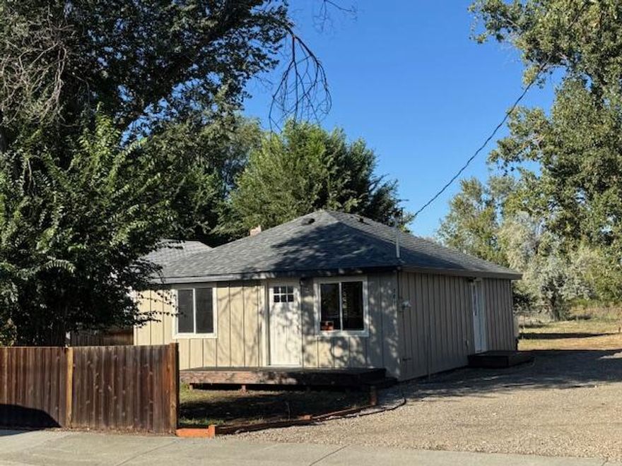 Cozy Mt Vernon Cottage On Large Lot! Renovated w/upgrades throughout, open floor plan, kitchen features painted cabinetry, wood counter tops, breakfast bar & tiled backsplash, living room w/oil monitor stove, wainscoting accent wall, ceiling fan & laminate flooring, 2 bedroom 1 bath w/tiled flooring, tiled tub/shower surround & single vanity, stackable washer and dryer, recessed lighting, laminate flooring, vinyl windows, new interior and exterior paint, new doors, composition roof, front deck, back entry porch, privacy fenced, shade trees, graveled driveway.  $200,000 #1177