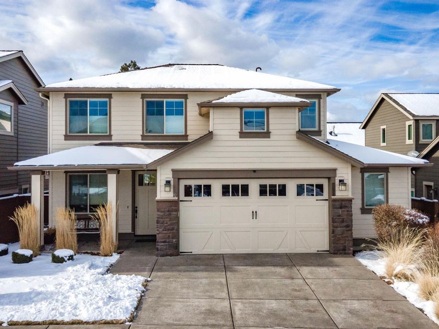 This immaculate 3-bedroom, 2-1/2 bath, 2,441-sf home located in the Bridges at Shadow Glen combines contemporary in-town living with the amenities typically found in a resort community. The two-story home –- which backs to natural open space & has Cascade Mountain views -– features an open floor plan that's ideal for entertaining or just relaxing with the family. The gorgeous kitchen boasts Quartz countertops, stainless-steel appliances, under-cabinet lighting & a central island with bar seating. In addition to the spacious living room, there's a downstairs office & upstairs den/bonus room. Other highlights: Energy Star heating, cooling & windows; large walk-in pantry; mudroom with built-in storage; oversize two-car garage with storage area; & fenced back yard with covered patio. Community amenities include a neighborhood pool, playground, full gymnasium with basketball court, game room, fitness facility, clubhouse, paved walking trails & access to nearby Alpenglow Park.