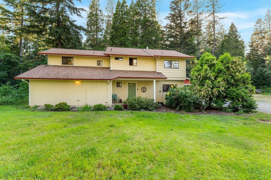 Country dream property located in a nice, treed area close to the river. This level 5.2-acre property has the perfect mix of grass, trees and backed by BLM land. This fantastic, well-maintained home features 2413Sqft of living space, 4 Bedrooms, 3 baths, 2-story, was recently updated. Has an office & bonus room w/separate living and family room. New LVP flooring throughout, new slate & tile backsplash in kitchen w/stainless steel appliances and new dishwasher. Stainless steel appliances stay. Murphy bed stays w/house.  Move-in Ready! Level acreage surrounding the property, ample space for outdoor activities, 70 young fruit trees, w/separate covered RV parking.  60'X30' heated garage/shop, inground sprinklers in front and rear of home, new sprinkler heads & valves, Covered patio. Enjoy two private decks on the 2nd floor, 1 off the primary.  Private yard with no visible neighbors