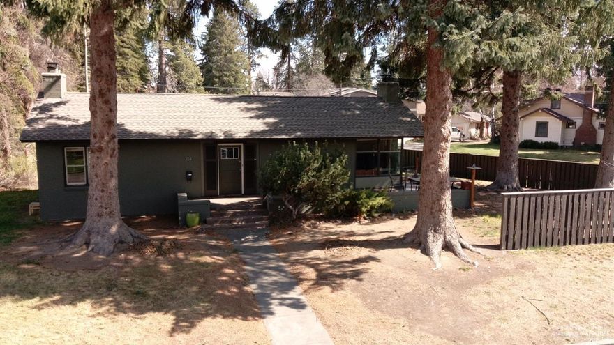 This charming home is located on incredible corner lot and located in the Old Town Historic District. This property is in the In the heart of Bend, with quick access to Drake Park (1 block), Downtown (5 blocks), and The Old Mill (5 blocks). This is an opportunity to live in the most desirable section of town. Bring your vision or use the architect drawings included ($15,000 value) the previous owners had made up. Very large and comfortable home on an amazing property ready to become your's.