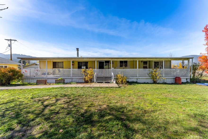 Experience the best of country living on 5.17 acres in Williams, OR! This spacious 3-bedroom, 2-bath home includes a private mother-in-law unit, perfect for extended family or rental income. Also 2 additional spaces perfect for an office or additional storage! Enjoy peaceful outdoor living with a serene pond and a versatile workshop ideal for hobbies, projects, or storage. With ample space for family, guests, and animals, this property offers flexibility and privacy while still being close to town amenities. Perfect for those seeking a rural lifestyle, multi-generational living, or a turnkey country retreat in a tranquil setting.