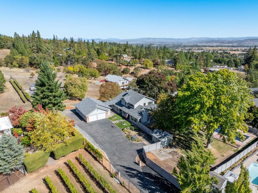 Beautiful Home conveniently located just outside Historic Jacksonville!  Sitting on a quiet 2-acres, this 4 bed, 2.5 bath home features a RV Shop, in-ground pool & more! Interior features include, Main level primary suite featuring a large walk-in closet & ensuite with double vanity, jetted tub. Kitchen offers a lot of counter space, granite countertops, & overlooks the backyard. Also you will find an, office ,  2nd living area with gas fireplace, large laundry/mud room & upstairs are 3 spacious  guest bedrooms. Oversized 4-car garage w/workbench & storage cabinets. Huge shop/RV storage building with attached carport & large open space perfect for horses, 4-H animals or garden area!
Come tour this one today!