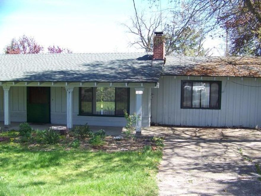 This amazing property goes from street to street to street. This is a fixer-upper in a great Ashland neighborhood. There is an existing one story home with 2 bedrooms in one wing with a shared bathroom and the garage was converted into the 3rd bedroom with 1/2 bath. Gorgeous oak flooring goes through a large portion of the home. Lovely spacious backyard has the potential for an ADU. The property fronts onto Park Street, the upper part of the lot is on Nezla, and the backyard faces Plaza. Buyers should check with the City of Ashland as to what they can definitely do on the property. Great location, great address, great potential. Being sold as-is.