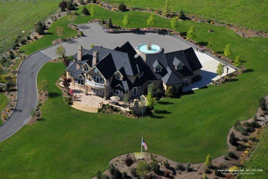 Are you ready for incredible? Meet 'The Villa at Crown Ranch.' Centrally located between Ashland and Medford, this is truly a premiere masterpiece with incomparable quality and prestige. Enjoy sweeping and unobstructed views in every direction, including vineyards, mountains, golf courses and city lights. Inside, the quality shows in the details: African mahogany, travertine, marble, and crystal. The gourmet kitchen includes a Thermador Professional gas stove, along with the appliances and other features you'd expect in a home of this quality. Just outside is the beautiful outdoor kitchen with wood-fired pizza oven, fireplace, commercial fridge and gas grill, all framed by magnificent views. Downstairs holds a theater room with electric reclining seats, 2 separate wine cellars (one for red and one for white,) tasting room, and large game room. This home is both elegant and fun. And for the most discerning buyer, the features and quality at the Villa may leave you feeling incredible.