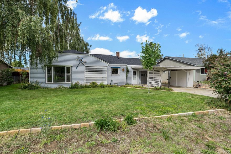 Modern comforts meet timeless charm. Everything in this home is brand new with a few kept original pieces from 1950. Interior features an entirely new kitchen, beautifully updated bathrooms with double vanities, quartz countertops, and a tile shower in primary suite. Open living space with an abundance of natural light and a functional layout makes for great entertaining. A lot of storage with original built-ins, a pantry, and large bedrooms all with spacious walk in closets. Plumbing, electrical, efficiency furnace, water heater, and insulation all installed in 2012. New roof May 2025. Backyard oasis with a 6' privacy fence, fully landscaped, paver patio and walkway, plus a cozy Lanai on the deck to enjoy mornings and evenings in. Garage, carport, and custom garden shed in the front. This home is turn key in a peaceful setting and location. Very well established neighborhood with Barnes Butte walking trail nearby, close to town amenities.