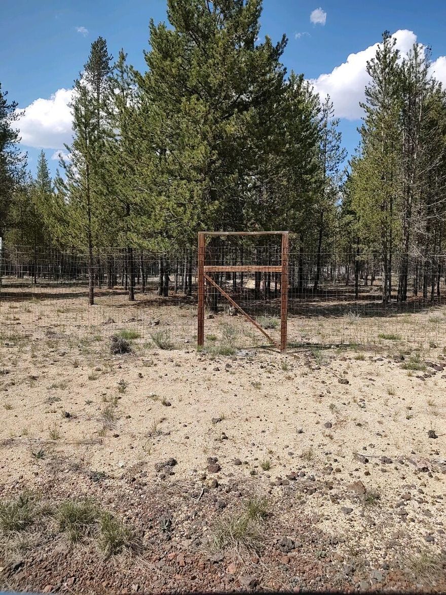 Come take look, Partially fenced, Seller has perk test. Only 8+- miles from La Pine.. You could build your dream on this level one acre lot. Electric is at the road.