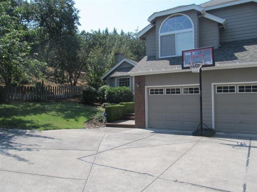 Great East Medford home located in Bel Air Heights is now available! The moment you walk in the front door you'll fall in love with all this home has to offer. Featuring four bedrooms and three baths, just under 2800 square feet, with separate living and family rooms, dining room area and kitchen with granite counters, stainless appliances and breakfast nook. Upstairs you'll find the large master bedroom with master bath that has tile flooring, jetted tub, separate shower, and walk-in closet, along with two other bedrooms and full bath. Situated on a very private .33 acre lot with a deck off the kitchen, patio off the family room and a beautiful in-ground pool, hot tub and Tiki Bar for all your entertaining needs!