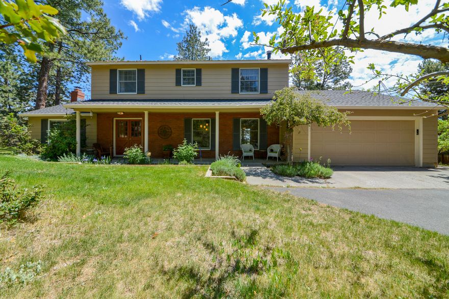 One of the largest westside lots this close to downtown.  Three quarters of an acre lot on the west side of Bend!  This is what you have been looking for! Four bedroom 2.5 bath 2 story home with views of Pilot Butte off the large back deck.  Live in the trees and sip your morning coffee while you enjoy the privacy and serenity this home offers.  All this only blocks from the river and downtown!!  Potential for development (6 lots) or plenty of room for a shop and ADU!