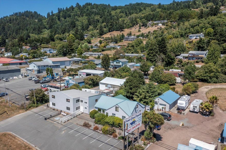 Discover nearly two and a half acres of prime, commercially zoned property at the South end of beautiful Brookings, Oregon. This versatile land includes two stick-built homes, a spacious 2000+ sqft restaurant, garages, a former cannery building, two small retail buildings, and three RV rental spaces. With high-exposure road frontage on historic Highway 101 and the Pacific Ocean just a stone's throw away, this property offers exceptional visibility and endless possibilities. Zoned for multi-housing, an RV park, retail, restaurant, or hospitality ventures, it's the perfect spot to expand your current business or launch a new endeavor. Don't miss this rare opportunity to create your dream enterprise in a stunning coastal setting!