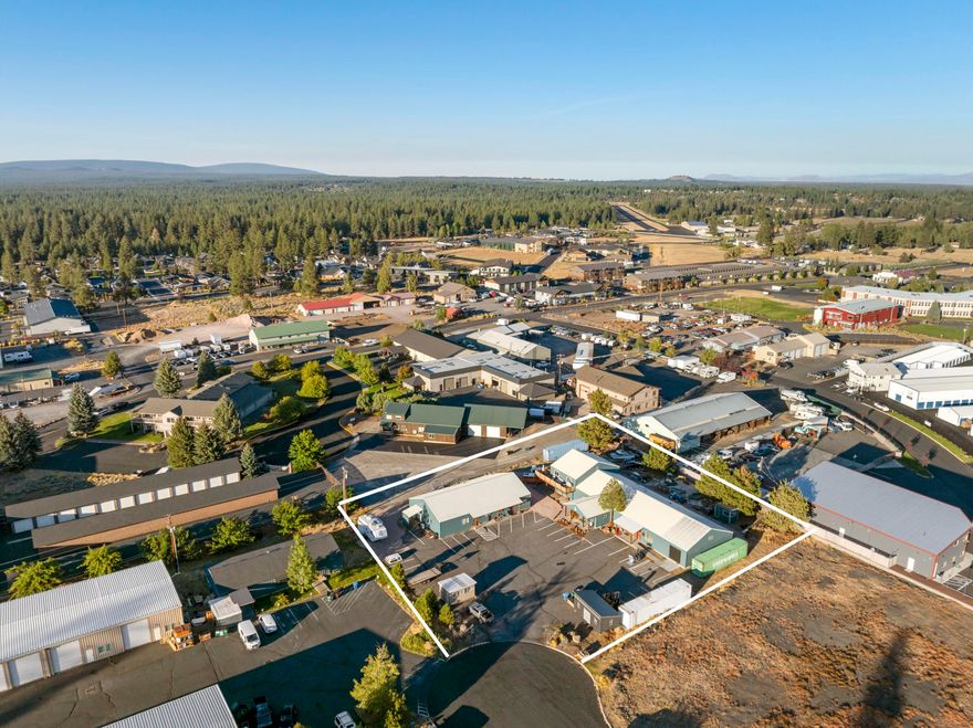 Highly flexible mixed use buildings in the Light Industrial zone of Sisters that allows multiple uses (currently wood art production facilities and sound studio / previously daycare, textile & decor manufacturing, fulfillment center, church). 100% occupancy for 5+ years. Zero build lot line with lots of undeveloped property allowing opportunity to add additional buildings or income producing storage. Larger building 6528sf with flex space that is easily divisible into six units, currently includes a 250sf office, four bathrooms and two docks (one covered 2 double doors, one with roll up). Recently remodeled 820sf apartment on the second floor. Smaller building is currently two units totaling 2880sf. Each has its own bathroom and own power meter. Low maintenance buildings; well insulated; outer load-bearing walls for easy flex;Multiple views of Three Sisters Mountains; Few blocks from busy downtown. 6.0% cap rate based on proforma.