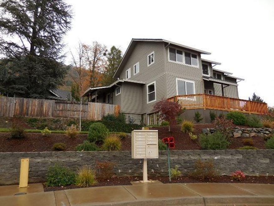 This NW area home has outstanding city and mountain views with something for everyone. This spacious 3 bedroom (could be 4) and 4 bath home sits on large .30 ac. lot. Two Master suites: upstairs Master suite features vaulted ceiling & Skylites, walk in closet, jetted tub and double vanity sinks, den and a study. Kitchen offers new cabinets, appliances, counter tops, pantry. Entry features wood flooring plus new carpet, paint and vinyl windows throughout. Main level features a living room and a family room. Lower level has French doors with full access to the outside yard, bathroom and abundance of space. Forced air gas heat & elec AC plus Cental Vac. Large deck, patio, spacious landscaped yard. Paved driveway sitting at the end of a cul-de-sac, detached 2 car garage, shed. Remodeled in 2013 and move in ready.