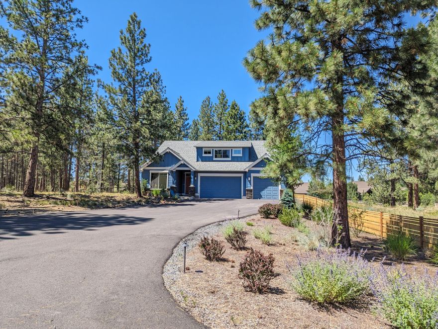 Situated on 2.45 acres adjacent to Bend city limits, this spacious home touts modern finishes, abundant natural light, and forest views located just blocks from Brookswood Meadow Plaza & 3 River Rim Parks. The kitchen opens to the great room with a fireplace and access to large paver patios and private backyard. The primary bedroom is tucked away on the first floor and has access to the patio & hot tub. Two add'l bedrooms, bathroom, extra large pantry, and laundry room & 3-car garage round out the downstairs. Upstairs greets you with a spacious loft area, large bonus room, bedroom with walk-in closet, and an upstairs bathroom. The backyard offers two large patios with a covered area, built-in grilling area, gas fire pit, & wood fire pit. The majority of the property is fenced and the driveway is paved. A detached heated 600 sf shop offers storage for toys and vehicles and has an attached 360 sf office with a bathroom, laundry, and outdoor covered patio, providing many possibilities.