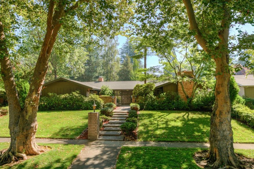 Your opportunity to live on the prettiest street in East Medford! The islands are filled w/mature trees, rhododendrons, azaleas, seasonal bulbs & flowers-truly beautiful year round. Both hospitals, the RV Country Club, shopping, parks & schools are just blocks from this neighborhood in the heart of East Medford. Purchase the 4 bedrm, 3 bath, single story home w/its wonderful floor plan & the abundant windows will allow your enjoyment of the lush landscaping from every room in the house. A living rm, formal dining, kitchen/great rm along w/a laundry rm are included in the home's 2725 sq. ft. There's a 2 car attached garage at the back of the home. The backyard oasis features a large patio & mature NW gardens for easy maintenance. The roof & furnace are newer. This estate is clean, comfortable & ready for new owners to add their personal touches & desired updates. Call for your appointment to tour now so you can purchase & enjoy this home & enviable location for years to come!