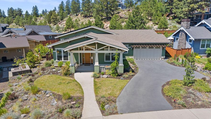 This single-level home is nestled on a private 0.23-acre lot near Discovery Park in Northwest Crossing—one of NW Bend's most connected and sought-after neighborhoods. Built by Solaire Homebuilders and certified Earth Advantage and Energy Star, this Net Zero home features 12-inch exterior walls, an Energy Recovery Ventilation (ERV) system for superior indoor air quality, and a 3-car tandem garage with a newly finished epoxy floor. Inside, hardwood floors extend through the main living spaces, complemented by soaring 11-foot ceilings in the great room. The primary suite offers a peaceful retreat with a private sunroom, heated bathroom floors, a heated towel rack, and a walk-in closet. Additional highlights include a versatile home office or third bedroom, a mudroom, and a full laundry room. With the shops, dining, and amenities of Northwest Crossing just moments away, this home delivers the ideal blend of comfort, sustainability, and location.