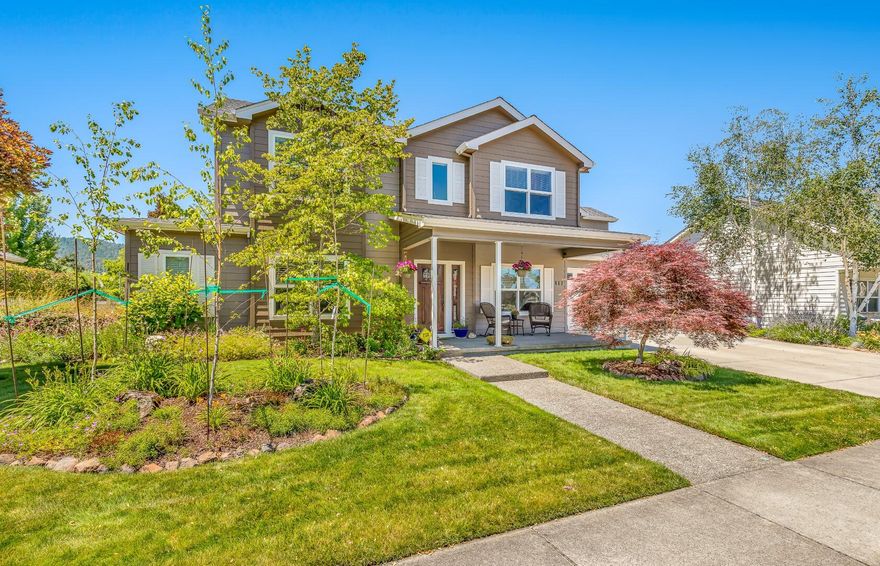 Beautiful home with a sparkling in-ground pool & spa, located in desirable Central Point Twin Creeks neighborhood. This home sits on .24 of an acre and features 4 bedrooms, 3.5 bathrooms, plus an office/den, formal dining area, 3207 sq ft, lovely hardwood & tile flooring, dual heating & air systems, commercial grade power/electrical, many upgrades and lots of natural lighting. Huge living room offers a gas fireplace & large windows. Gourmet kitchen boasts a large island, eating bar, gas range, granite counters, tile backsplash and abundant cabinetry. Great primary suite has views of the mountains, a sitting area, attached bathroom with dual vanity, large shower with double shower heads, jetted tub, tile floors and walk-in closet. Private backyard oasis offers a fantastic in-ground pool (salt water) and hot tub, covered back patio, beautiful landscaping and backs up to Conservancy land. Finished 2 car garage is extra deep and features a shop area and bath. Immaculate & move-in ready.