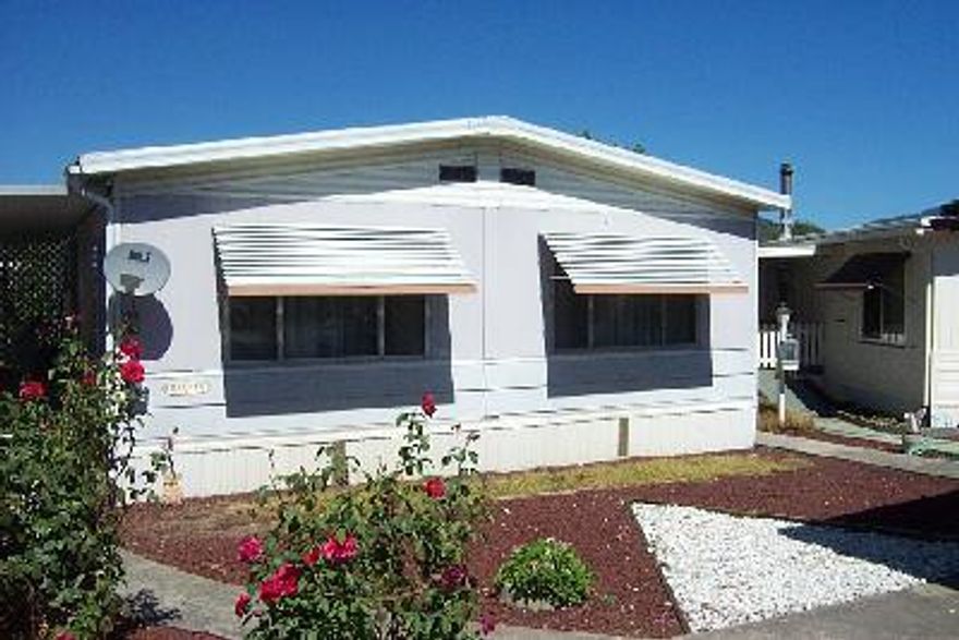 1971 Mfg home sits in a quiet cul-de-sac in the Rogue Lea Estates, a very popular 55+ home park in SW Grants Pass. Home only, no land. 1248 Sq. Ft. 2Bd./2Ba. Nice yard with room for garden. Large deck. Priced to sell quickly. Needs some TLC. Being sold as is. Price reflects a very generous allowance, and then some, for updating and minor repairs that may be needed. Buyer must be accepted by park management.