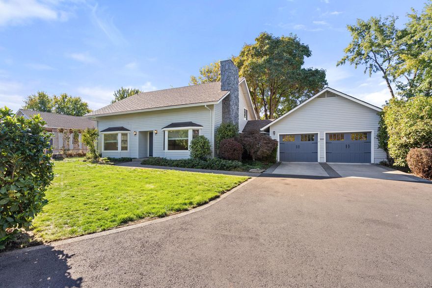 Spacious Home on a Half-Acre w/Shop in Town! This rare find offers a perfect blend of space and comfort right in town! On a .54-acre lot, this 4-bed, 2.5-bath home features a 26'x50' shop, w/plenty of room for your hobbies, storage, or toys. Step inside to discover fresh paint, new carpet, and beautifully refinished hardwood floors throughout. The sunken living room with fireplace creates a cozy gathering space, while the family room with a 2nd fireplace & dining area opens to a patio w/sliding glass doors perfect for entertaining or relaxing. The kitchen shines with tile countertops and stainless steel, gas cooktop, and classic white cabinetry. The main-level suite has a private bath, and upstairs you'll find three additional bedrooms, a full bath, a large bonus room, and an office nook with built-in desk. Highlights; insulated attached garage w/openers insulated shop w/attic storage, carport, pergola-covered patio. Enjoy a private front & backyard, asphalt drive, lifetime roof 2005.