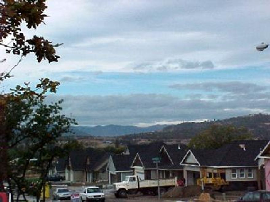 Beautiful building lot will take a single level home with great views.