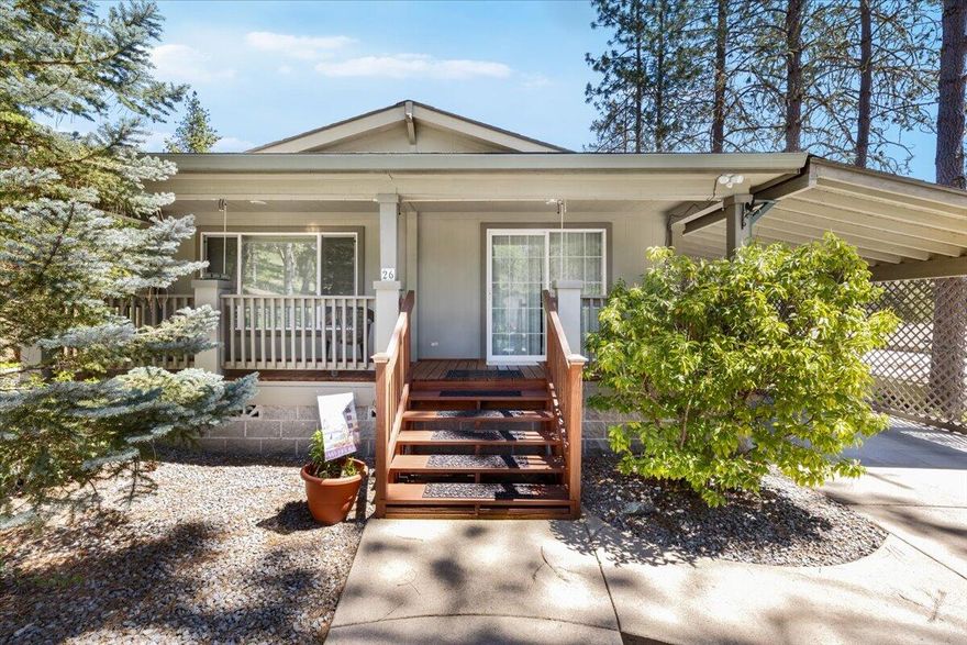 Stunning double-wide in premier Rogue River Mobile Estates! Prime location at park's edge offers breathtaking mountain and forest views. This immaculate 1,485 sq ft home in exclusive 55+ community features vaulted ceilings, thoughtful floor plan with 2BR/2BA plus office. Brand-new kitchen appliances, spacious pantry, and move-in ready condition throughout. Quality construction meets modern comfort. Includes all appliances, 2 sheds, plus bonus shop/structure. Peaceful setting with easy town access. Space rent $995/mo covers water, septic, trash. Your carefree lifestyle awaits!