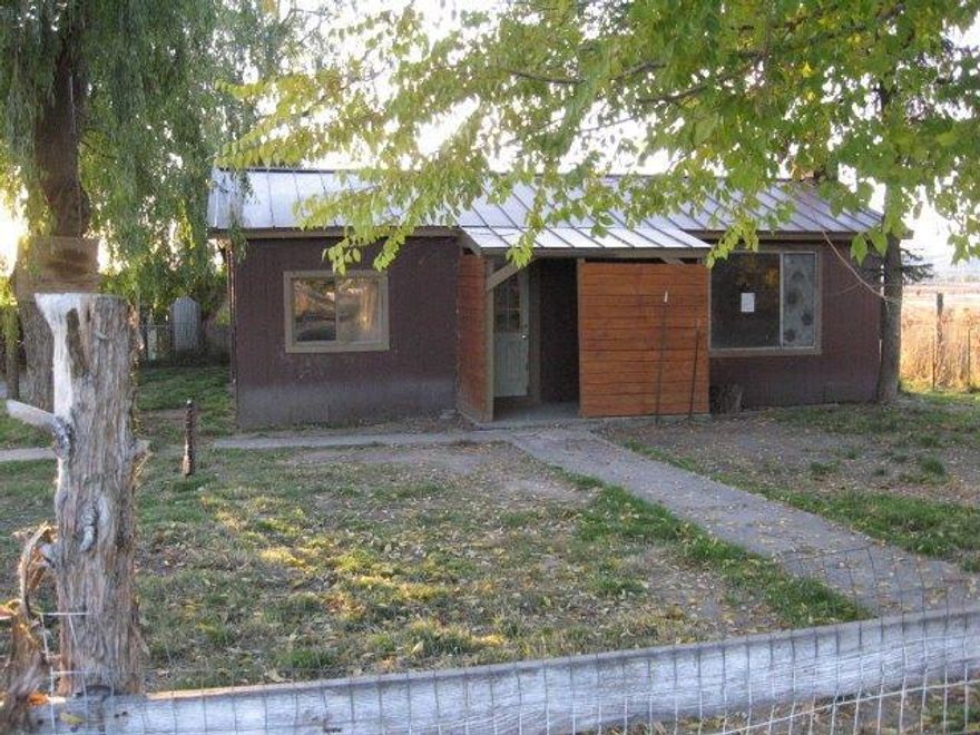 Price Reduced!! Sitting on 1.95 acres. Has a detached garage with work area. Carport. Located nearby to the airport and the South Side Expressway. Home needs work but the land alone is worth the price of the home and land. Very Very important to download and read the addendum in external documents. This addendum gives instructions on making an offer on a HUD owned home and also has information unique to this home.