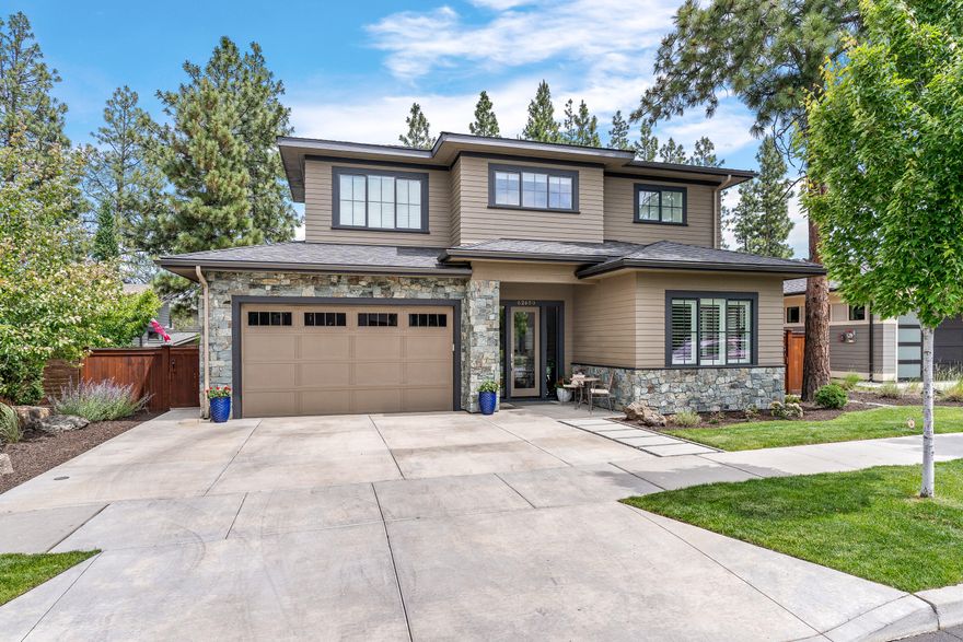 Come visit this lovely home in Three Pines Ridge on Bend's desirable Northwest side! It features an open floor plan with the primary bedroom and an office on the main floor with two more bedrooms and a loft upstairs. The three bathrooms and kitchen have all been remodeled with fantastic finishes and great lighting. The kitchen features a beverage fridge, a bar sink and beautiful 6x8 foot slab island. The yard is fully fenced and the covered patio features a floor to ceiling ledgestone fireplace. This home is a must see.