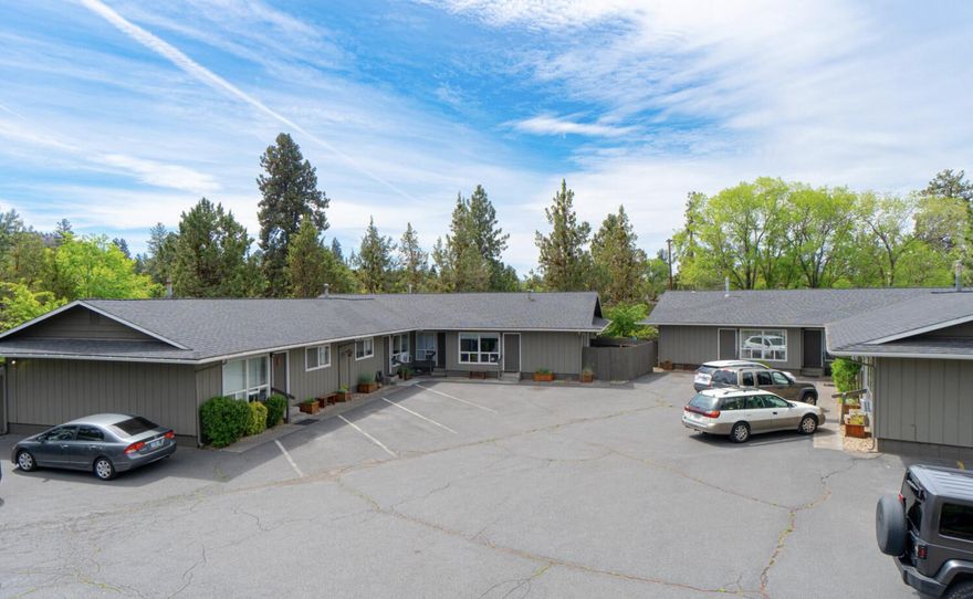 Exceptional investment opportunity! This well-managed and maintained 8-plex in Bend's desirable midtown offers convenience with its proximity to Orchard Park, shopping, dining, and excellent walkability. Each 4-plex is situated on a separate tax lot, making the property eligible for residential lending on each individual 4-plex. Each single-level unit features 2 bedrooms and 1 bathroom, supported by a strong rental history. There is potential for additional units and opportunity for future growth. All units are equipped with gas wall furnaces and private decks, with units offering upgrades such as tiled showers, new paint and flooring. Some units also include window A/C units for enhanced comfort. Parking is ample with 4 designated spaces and additional guest spots. All units are currently occupied. Showings are easy to arrange! Don't miss this rare chance to own a pair of well well-kept 4-plex properties in a sought-after location, offering both stability and expansion!