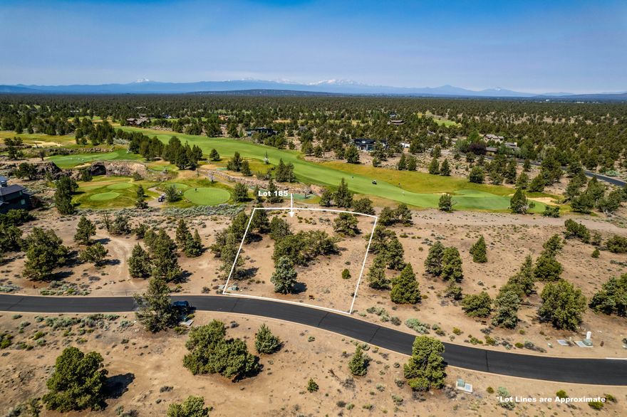 Very special lot located above the 7th green and looking directly down the signature 8th hole of the Tom Fazio Championship Course at Pronghorn Resort.  An amazing golf course location also boasting Cascade Mountain views from Mt. Bachelor all the way up to Mt. Hood. Enjoy being out on the point of Canyon View Loop - this lot opens up to the west allowing you to take in clear views of the golf course and mountains. One of very few lots located in this prestigious location, Lot 183 has an unobstructed view of the tee, green, and world famous lava tube of the par 3 8th hole. This .47 acre parcel is a gem and deserves to be seen in person to take in the incredible setting. Price includes $60,000 Seller contribution toward Buyer's required Pronghorn Membership Deposit.