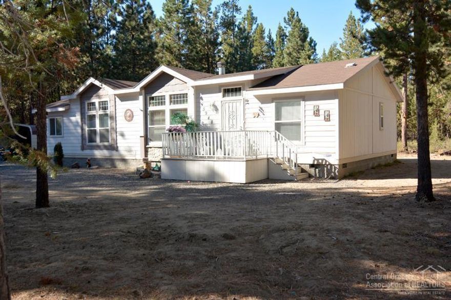 Newer Nashua manufactured home sitting on 1 acre, this 3 bedroom, 2 bath, 1456 sq. ft. home has many upgrades including kitchen cabinets and granite counters with laminate floors, large master with soaking tub with walk-in closet. Close to La Pine State Park, Deschutes River and National Forest. Call Lisa McLuskie from imortgage at 458-206-2026 for loan packages on manufactured homes that have been moved from the original location.