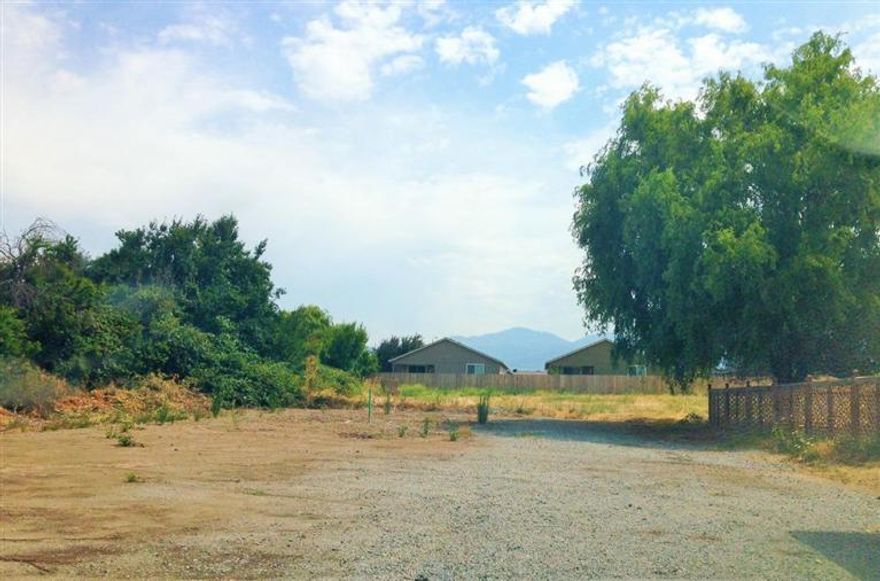 2 Ready to build lots with ALL utilities including, Electric, Phone, Water, water meters, Storm drain and Sewer all on the property. (RVSS sewer is stubbed in). These Lots are flat, and ready for you to build. There are two lots. Current SFR-6 Zoning but across the street is SFR-10. Possibility to dense-ify the lots to SFR-10 and build a set of townhomes or duplexes on each or a house with ADU. Purchaser to do own due diligence with the city regarding zoning and planning restrictions. Total .40