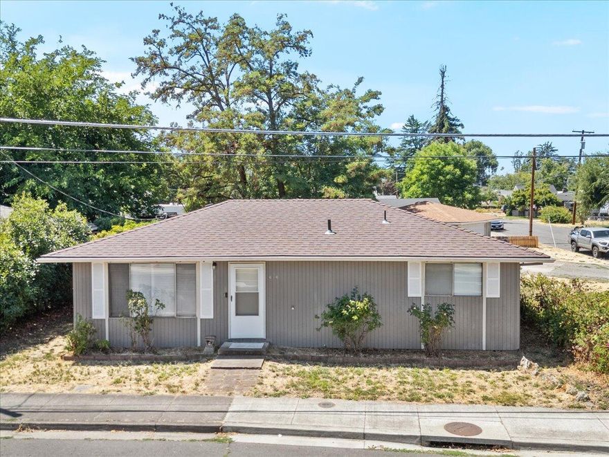 This 3-bedroom, 2-bath home is located in a well-established neighborhood just minutes from shopping, dining, and recreation. It features a newer roof (installed within the last 5 years), a covered back porch, and a detached two-car garage separated by a small creek, with a bridge providing easy access to the house. The fenced backyard adds extra functionality and charm. A great opportunity for first-time homebuyers or investors.