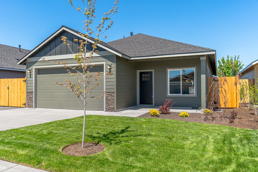 Premier 55+ mature living community in beautiful NW Redmond. Situated just minutes from amenities, medical facilities, the Dry Canyon, trails & parks. Well appointed home w/a comfortable Great Room style floor plan & Master separation. Open kitchen w/massive central island, Quartz counter tops, designer tile back splash, SS appliances & a gas range. Knotty Alder cabinetry & classic hardware & fixtures. Luxury wood look flooring throughout main living space & carpet in the bedrooms, vinyl plank in the baths. Spacious living room w/gas burning fireplace & plenty of space to entertain the whole family! Master Suite features a tray style vaulted ceiling & huge walk in closet, dbl vanities in the bath & glass shower door. High efficiency gas furnace & water heater, pre wired for A/C. Double car garage w/wi-fi garage door opener, front landscaping, auto sprinklers & fully fenced too. Additional floor plans available - call a REALTOR for details!