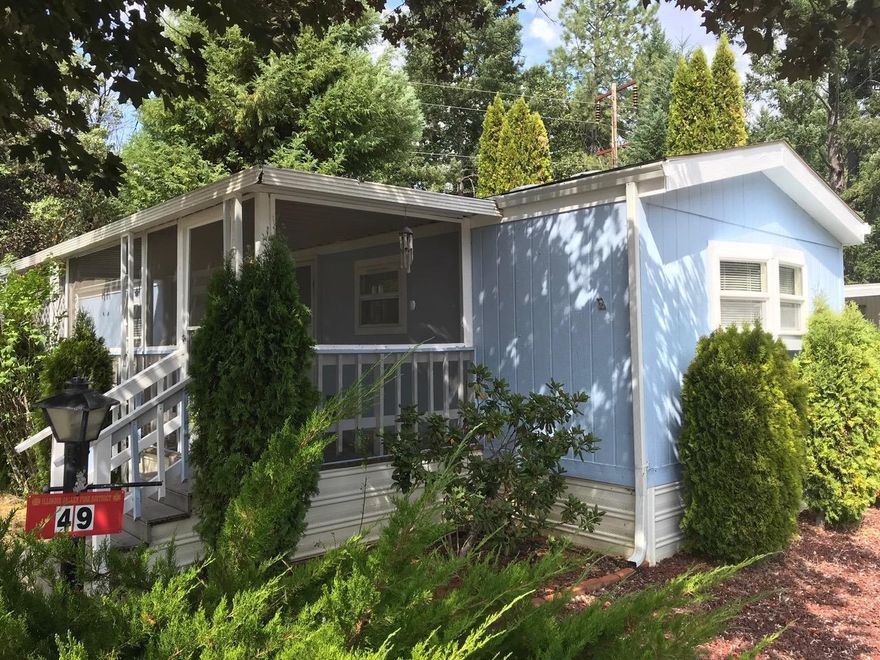 Very Clean and Well Kept 1993 Manufactured Home in the Desirable River Valley Village Park! This Home offers a Comfortable Open Floor Plan, and Vaulted Ceilings in the Living, Dining, and Kitchen Areas. This Home features a few Nice Upgrades as well, inclusive of a Heat Pump! The Large Carport offers plenty of Paved Covered Parking, and TWO Nice Storage Sheds provide plenty of space for your Personal Effects. Fantastic Covered and Screened Front Porch is perfect to relax on in any weather. Seller will consider selling this Home Furnished with an Acceptable Offer to Seller. Don't miss out on this Well-Priced Clean and Comfortable Home!