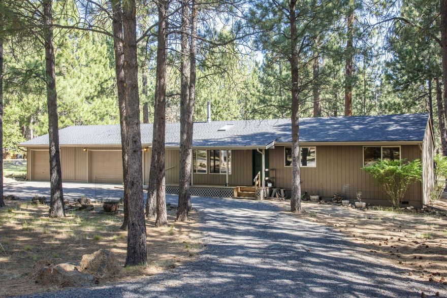 Charming single level ranch style home on one acre. This 1,274 sq ft, 3 bedrooms 2 bath home is within a quarter mile to access of the Deschutes National Forest. Public trails and year round activities. Features a open concept entry with woodstove for cozy warmth throughout the home. Kitchen has dining area with sliding doors to the back deck for entertaining. An Attached 3 car garage allows for more storage or parking. Crossroads is one of Sisters most sought after neighborhoods, close to Sisters Schools and the charming town of Sisters.