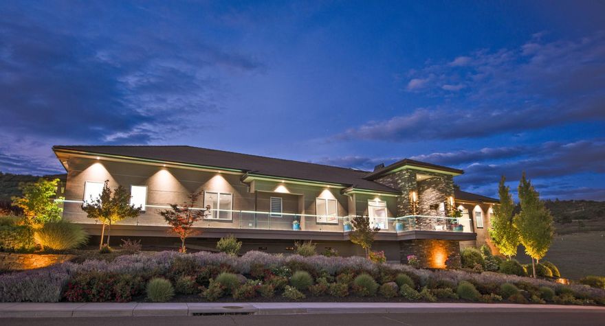 Modern Contemporary Custom built Pagnini home in Saddle Ridge w/views of the Valley. Grand entry w/10' wood/glass door; 4 bdrms + office & glass temp controlled 300 bottle wine rm, fitness rm, upstairs bonus area rm w/storage. Great Rm w/custom tiered ceiling w/lighting & gas fireplace opens to kitchen that features heated island, Thermador appliances, wet bar & glass cabinets, Lg walk-in pantry & sep. laundry rm. Hickory hardwood flooring, designer carpets, remote window treatments. Full wall slider leads you to AMAZING outdoor living area w/ wood burning fireplace, TV, full outdoor kitchen, Solar Pebble Sheen pool w/3 waterfalls, 9' High Res Projection screen, firepots, 10 ceiling electric heaters & Jacuzzi! Master ste w/ balcony, his/hers closets, frame fireplace, soaking tub & walk-in shower w/multi shower heads & towel warmer. Concrete tile & metal roof, 3 car garage w/ built in cabinets & work area w/sink. 2 HVAC, central vac, security system & battery back up for power.