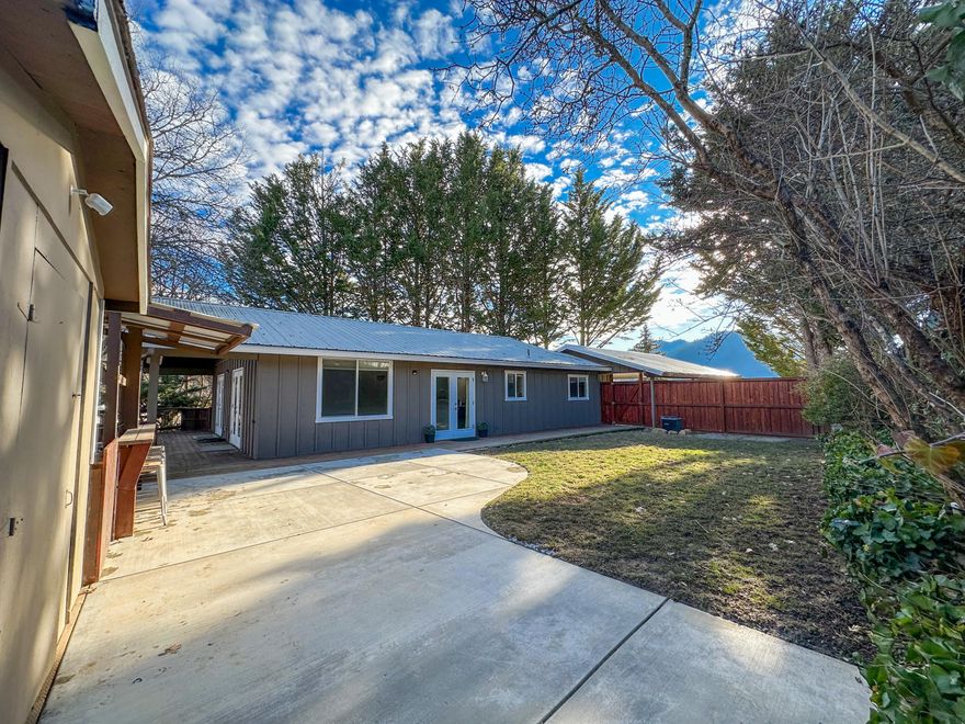 This charming single-family home offers beautiful views and it's also nestled on a quiet cul-de-sac which ensuring both peace and privacy. With 1,275 square feet of living space, this home offers 3 spacious bedrooms and bathrooms, providing ample room for your family. The modern kitchen is a culinary delight which offers beautiful granite countertops. Step outside to discover two expansive decks in the backyard, perfect for outdoor entertaining or simply relaxing in nature.  Offering the the perfect storage shed for tools and yard equipment.  The large driveway provides plenty of parking space for guests. Embrace comfort and tranquility in this delightful home!