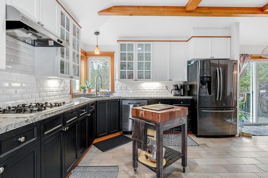 This adorable farmhouse just outside of the Shady Cove community and minutes to world-class fishing on the Rogue River has it all! Upon entering you are greeted by beautiful bamboo floors, spacious living room, wood stove and exposed beams that carry though to the dining area and into the stunning kitchen which has granite counters, tile floors, modern appliances and a propane cooktop. You will appreciate all main level living, a luxurious master w/ensuite, heated flooring in both bathrooms and a large laundry room w/floor to ceiling cabinetry. Head downstairs to the daylight basement bonus room w/bar, large utility closet and an unfinished area that could easily make for in-law quarters or an Airbnb w/private entrance (buyer due diligence). Additional amenities include; 1.44 flat fenced acres, 2 stall barn, custom chicken coup, swing set, wood shed, detached garage w/built in shop area, RV parking, patio w/fire pit, covered front porch, back porch and new exterior paint