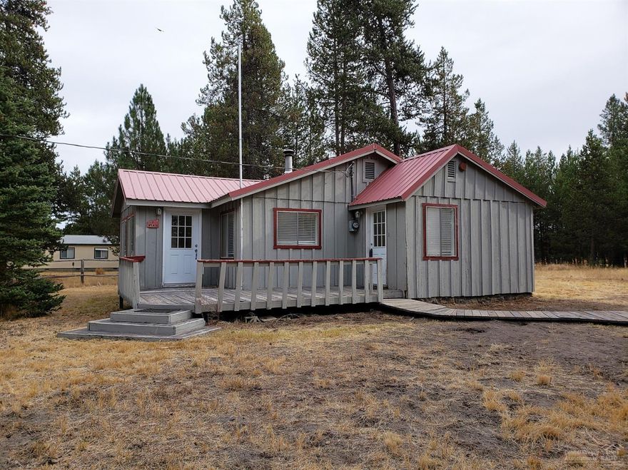 Come Make This Little Bungalow Yours! AS IS.... Needs TLC... granite tile counter tops, cabinetry & kitchen appliances. Bathroom tiled floor, shower/tub surround & granite tile counter top. Grounds are fenced, multiple storage buildings one with dog run. Relax on your deck and enjoy living in the Lazy River South Community. Gravel circular drive way provides space for your visitors. Enjoy All 4 Seasons of Central Oregon Recreation. Just minutes to Lakes, Rivers & Trails.