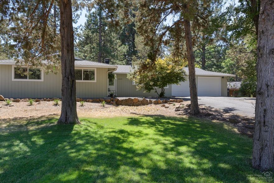 This beautiful single level home is located in highly sought after Tillicum Village. 3 Bed/ 2 Bath on a spacious . 41 acre lot with a park-like setting that backs up to a large common area. This home offers a spacious family room, newer ductless heating and A/C system, eat-in kitchen plus dining area, and new wood flooring throughout. RV parking & oversized garage are ideal for an active lifestyle. This home is a must see and won't last long!