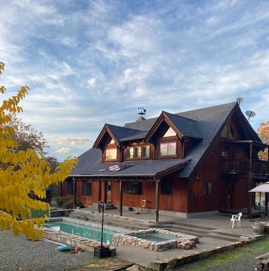 Beautifully designed with tongue and groove siding, Port Orford Red Cedar, open bean ceiling featuring a stunning 28 ' river rock fireplace, radiant floor heating . Master bedroom has a cozy gas fireplace with open beam ceilings and huge walk in closet. Master bath with soaking tub and walk in shower with two shower heads. Kitchen has a 6 burner propane wolf stove. Fenced in horse pasture  and cover . RV Parking. Awarded best owner/builder project in 2002. ADU is 560 SQ feet above garage. Plenty of room for toys in the 2 plus garage with area for boat and 1/2 bath. Another room in back of garage ideal for storage . Inground pool and Hot tub ( The main house has two bedroom and the ADU one bedroom 1 bath )