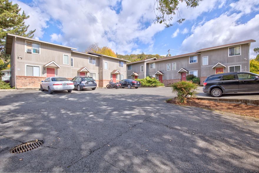 Great Investment Opportunity! 7-plex in desirable area - close to shopping. 2 bedrooms/1 bath spacious townhome units. Very well maintained and managed professionally.