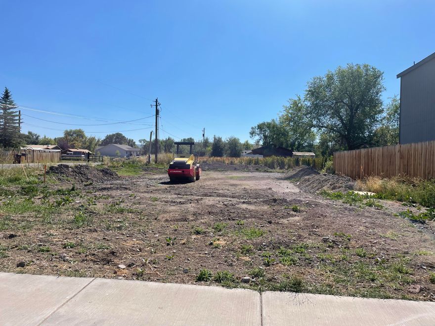 Development Opportunity!
FOUR Zero lot line townhome lots with approved building plans available in this cluster development. Other possibilities for these lots include a triplex, duplex or a single family home. Manufactured homes allowed as well. Utilities to the site-water, sewer, electricity. Sidewalks in. Property not located in floodplain. Many possible options exist with this property. Bring your ideas and creativity to this investment opportunity!
Buyers to do their own due diligence.