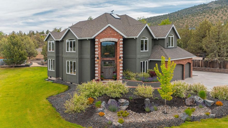 This completely updated home offers the perfect blend of rustic charm and refined elegance, with a balanced combination of natural elements and modern finishes. The rustic features such as metal and reclaimed accents add warmth and character, while the refined touches, like quartzite counter tops, steel wrapped fireplace and contemporary fixtures create a sophisticated atmosphere. Heated floors in the primary bath.  All bedrooms upstairs.  
New zoned heating and AC units.
Beautifully landscaped yard, with new 3 hole putting green, perfect for outdoor entertainment or relaxing. 
Home sits on 5 acres with great mountain views and views from almost every room.  Two huge paver patios, propane fire pit and outdoor TV.  Beautiful fenced, raised bed garden.                                                                                       Huge 40' x 42' shop with 2) 10' x 8' doors and 1) 12' x 16' door.

See attached documents for list of updates to this beautiful home.