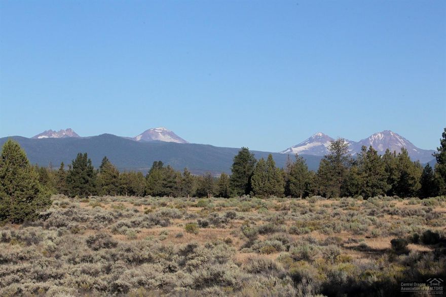 Newly released premier lot in Pacific Cascade Heights, a new collection of 14 ten-acre private homesites on Bend's west side. This parcel offers 9.67 Ac, varied topography w/ thousand year old rock outcroppings, old growth Junipers, Cascade Mtn views & a partial drive. Each parcel offers privacy & flexibility in home design & construction, a 5 min. drive to both Tumalo State Park & Trader Joe's, & is walking distance to Bend's newest elementary, currently under construction. Country living minutes to town.