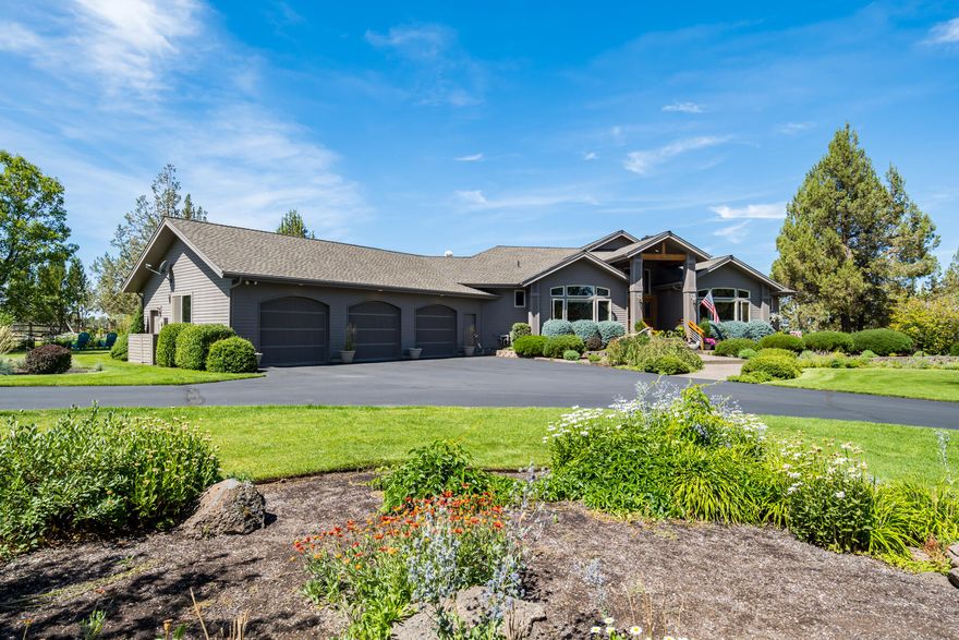 Spectacular panoramic views of the Cascades abound from this meticulous custom built, 1 level home ideally situated on a manicured 20 acres at the end of a quiet cul de sac. A gated, paved driveway leads you to the magnificently landscaped entry. Quality finishes & features in and out including slab granite counters & backsplash, stainless appliances, double ovens, pot filler faucet over the Dacor range, nearly 1200sf of mahogany decking running the width of the rear of the home, a fenced garden area, & a completely inground and timed irrigation system fed by 12.5 acres of Central Oregon Irrigation District water  for the pasture. Primary bedroom & large, private office/den are ideally situated away from the other bedrooms and guest bath. 3 car garage plus detached 30x40 garage w/ workshop & half bath. Avion Water provides delicious, chemical-free water for household use. Relax & enjoy the surroundings at several outdoor sitting areas. Miles of BLM trails are just across Bennett Rd